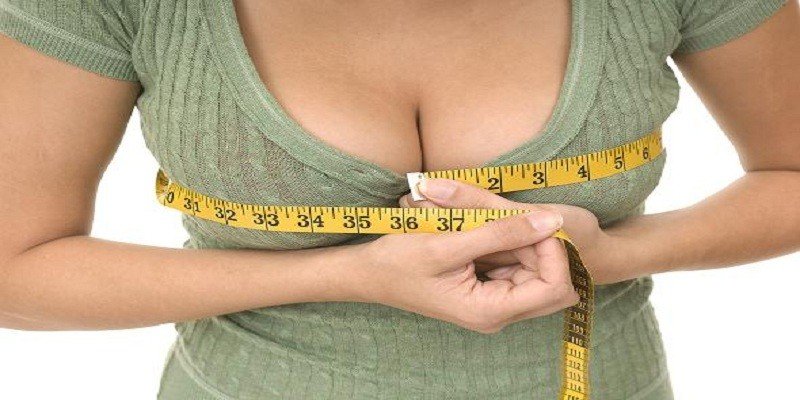 Woman meauring chest